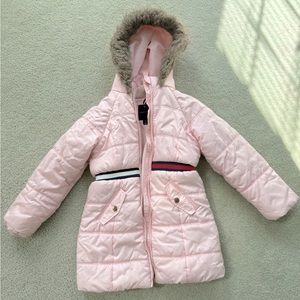 Pink coat.